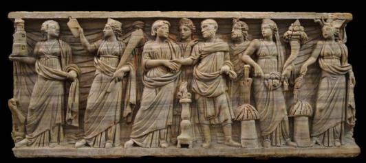 Depiction of an elite marriage scene with personifications to the left (Portus, Annona) and the right (the Senate, Abundantia, Africa) wearing the stola and Herculean knot of brides. (Palazzo Massimo alle Terme, Museo Nazionale Romano)